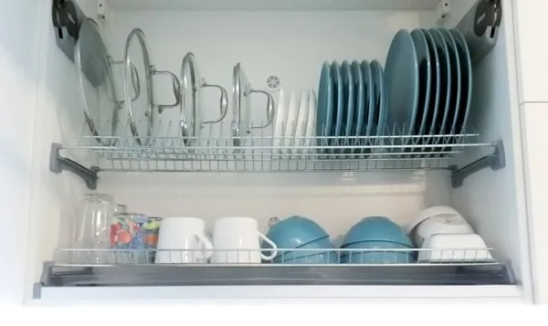 13 идей хранения крышек от кастрюль и сковородок на кухне. Подставка для крышек от кастрюль. 2